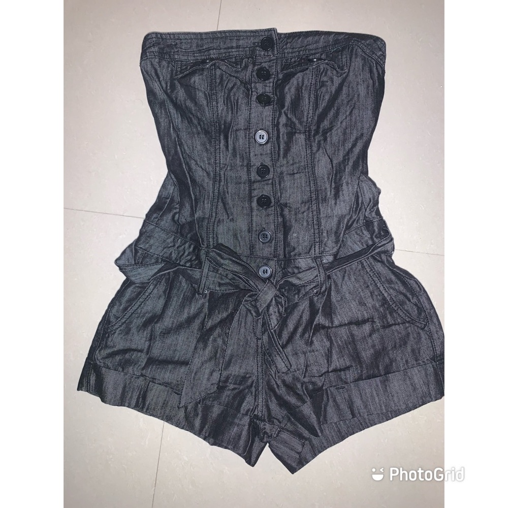 Denim romper with belt and pockets.